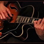 hands on guitar